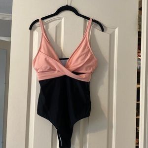 Never worn one piece swimsuit